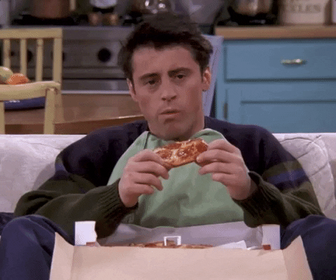Joey from the TV show "Friends" stuffing his face with pizza and saying "I don't know." 